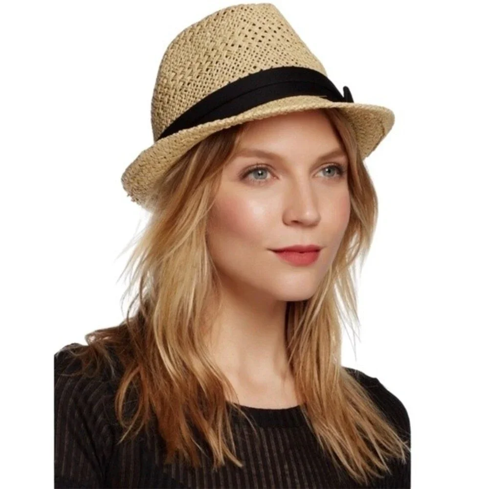 Woman’s black banded straw fedora hat